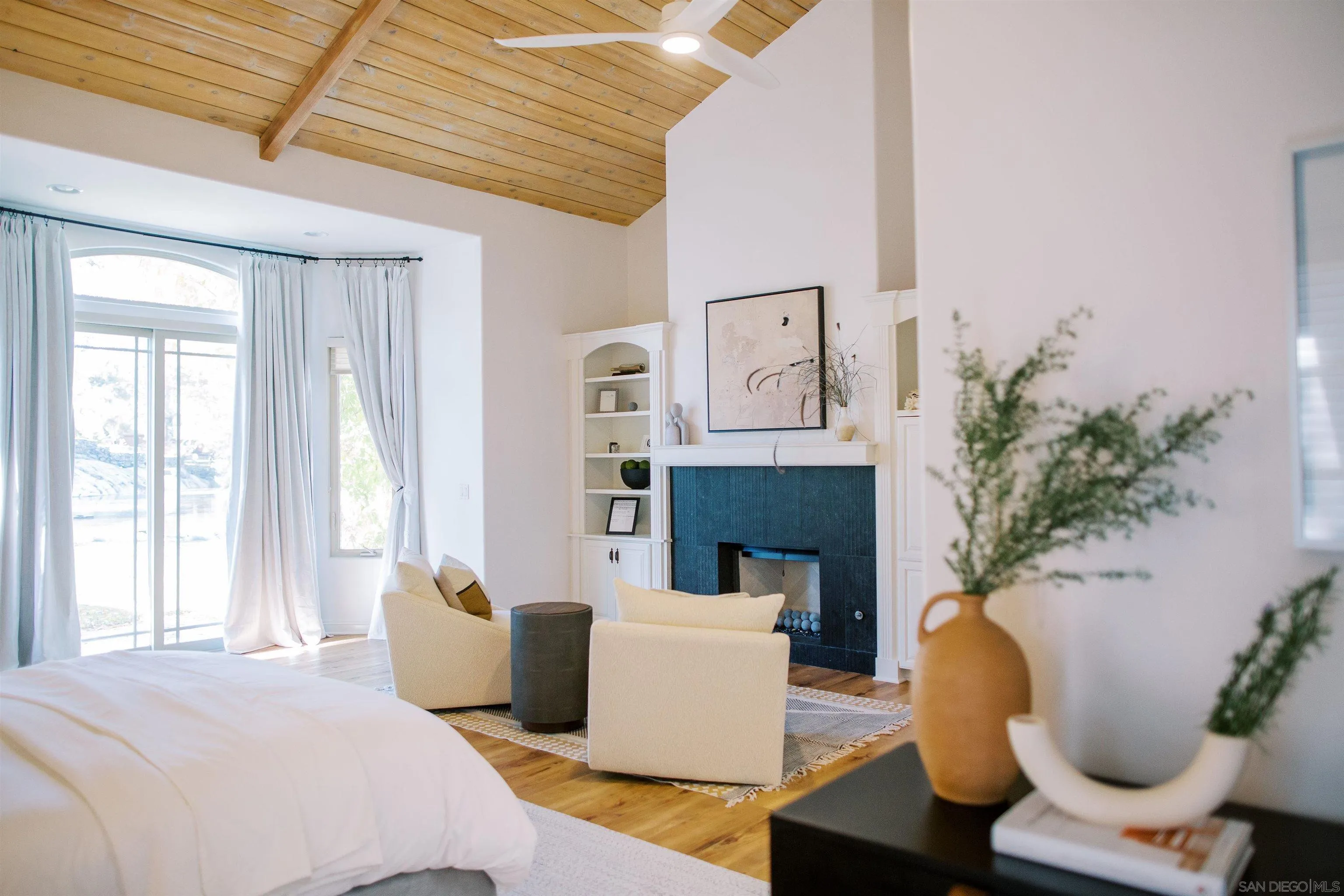 16163 Del Norte Poway, CA 92064 - Photo 12 of 41 a bedroom with furniture and a fireplace