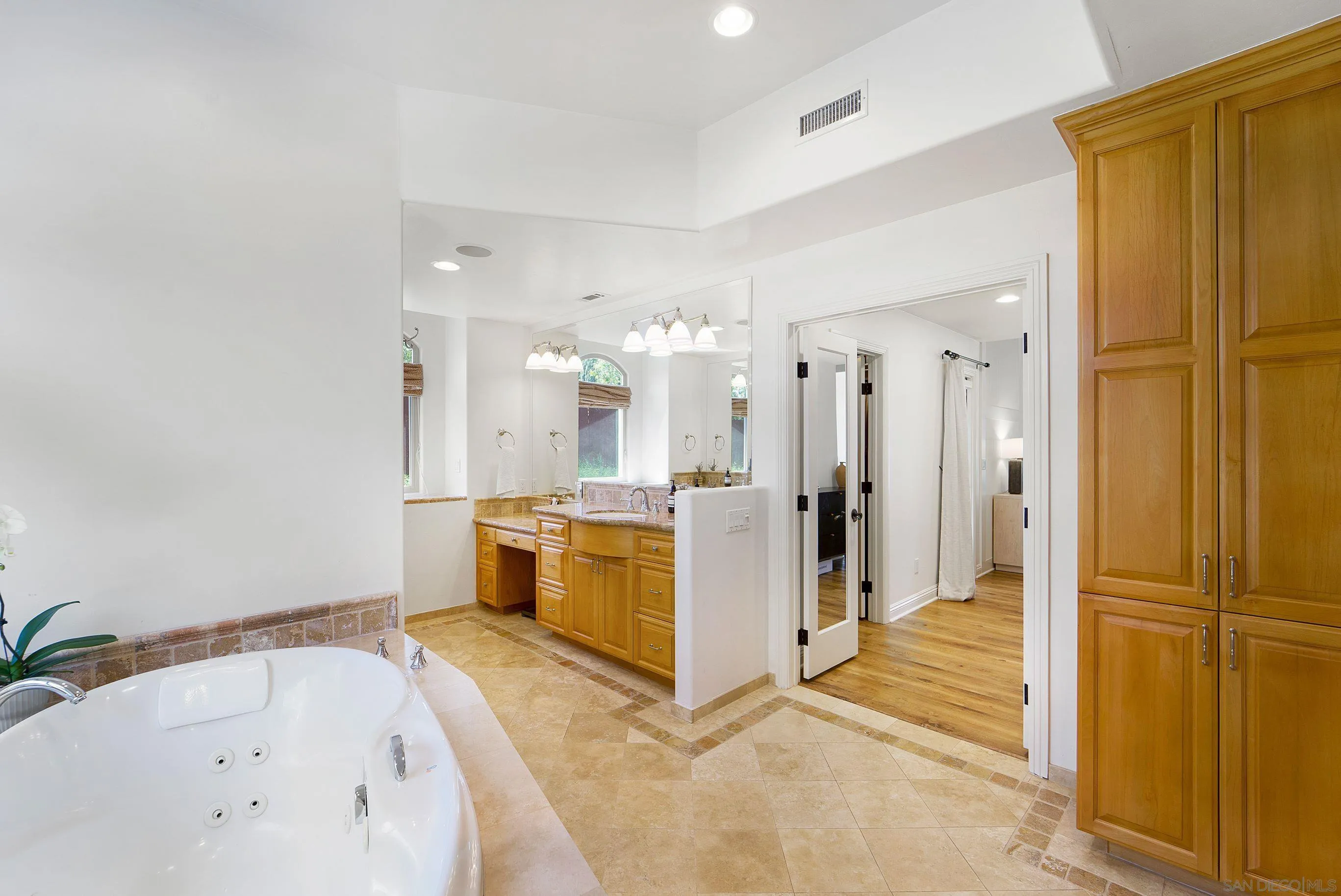 16163 Del Norte Poway, CA 92064 - Photo 13 of 41 a large white kitchen with a sink