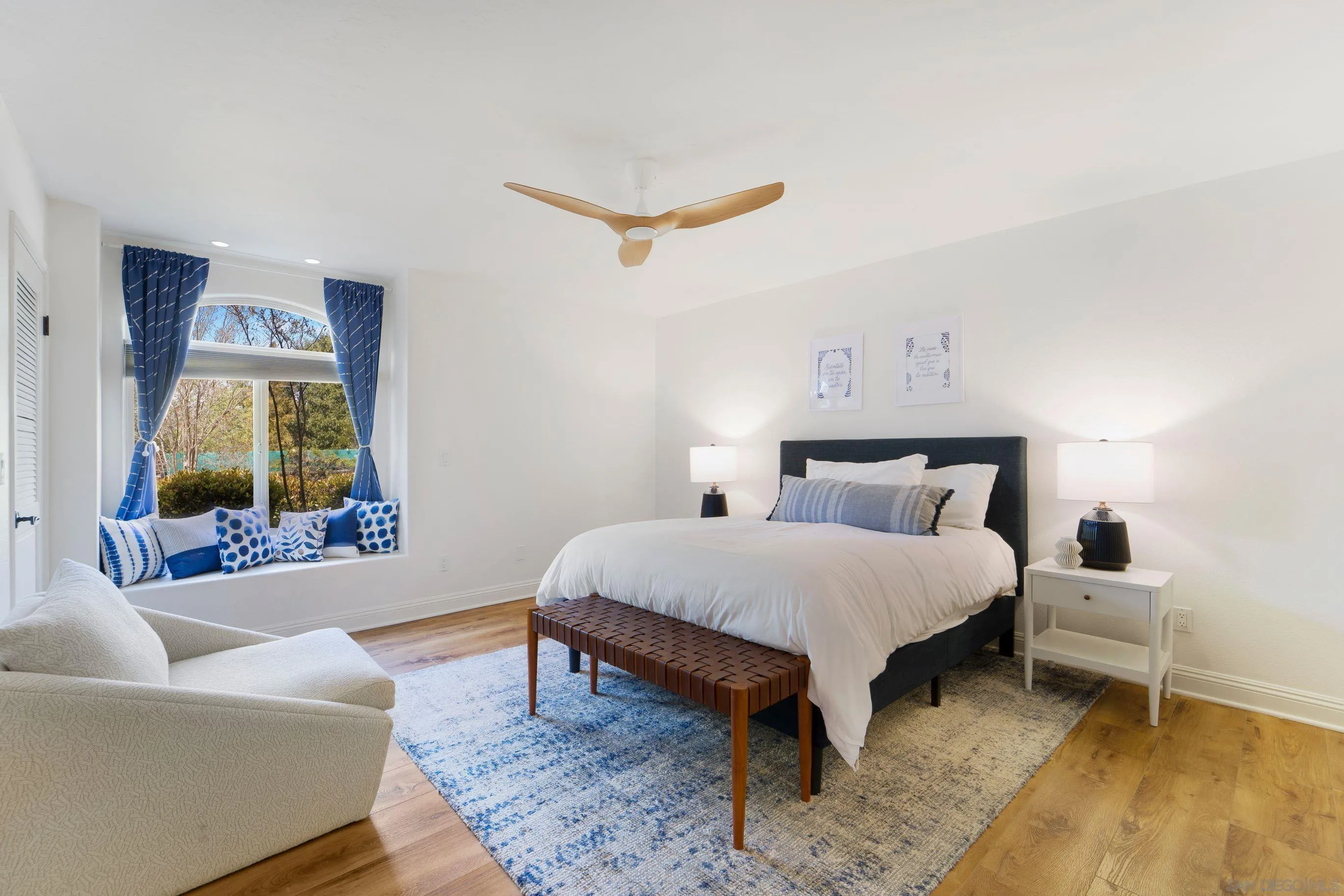 16163 Del Norte Poway, CA 92064 - Photo 16 of 41 a bedroom with a bed and a couch