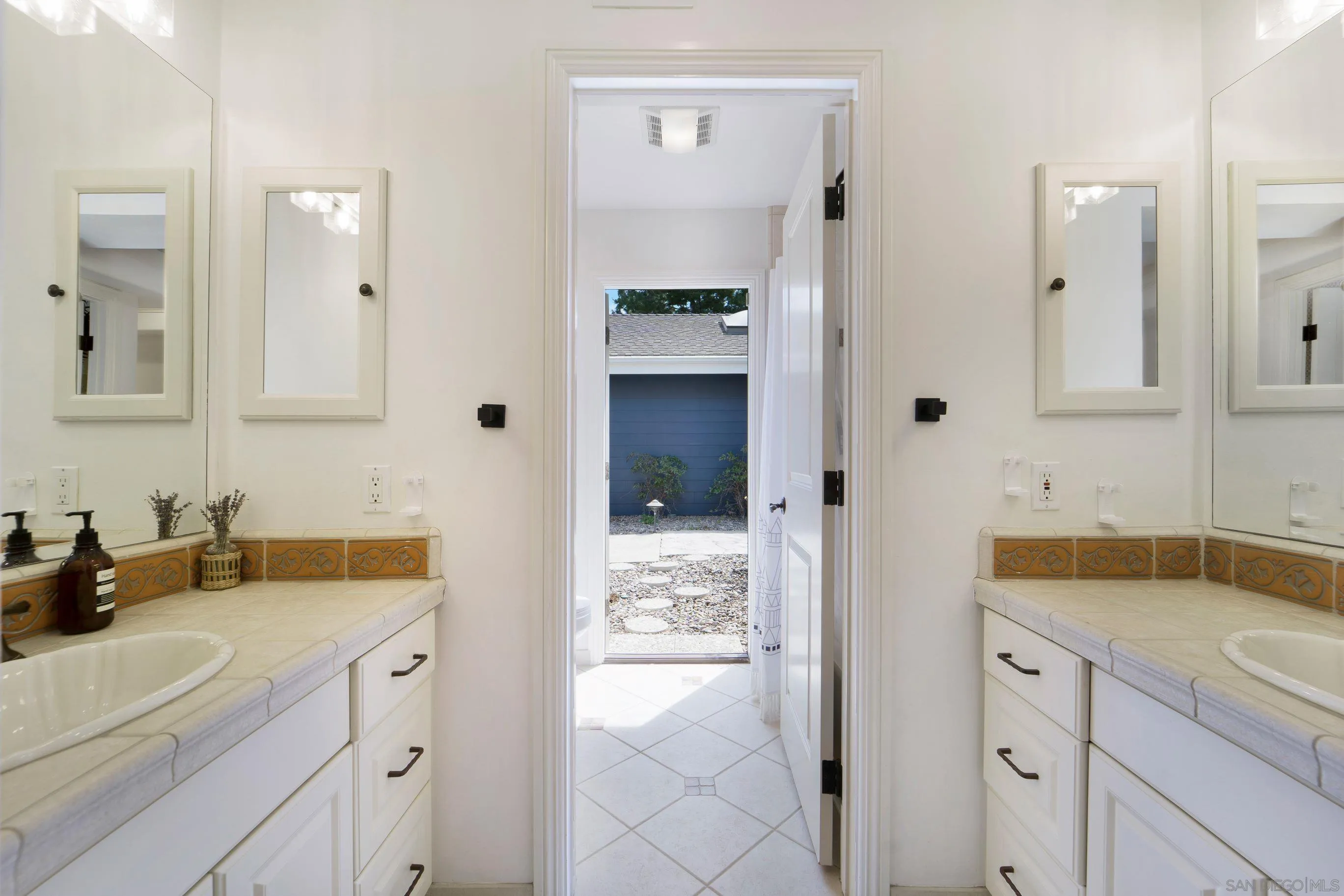16163 Del Norte Poway, CA 92064 - Photo 20 of 41 a bathroom with a sink and a mirror