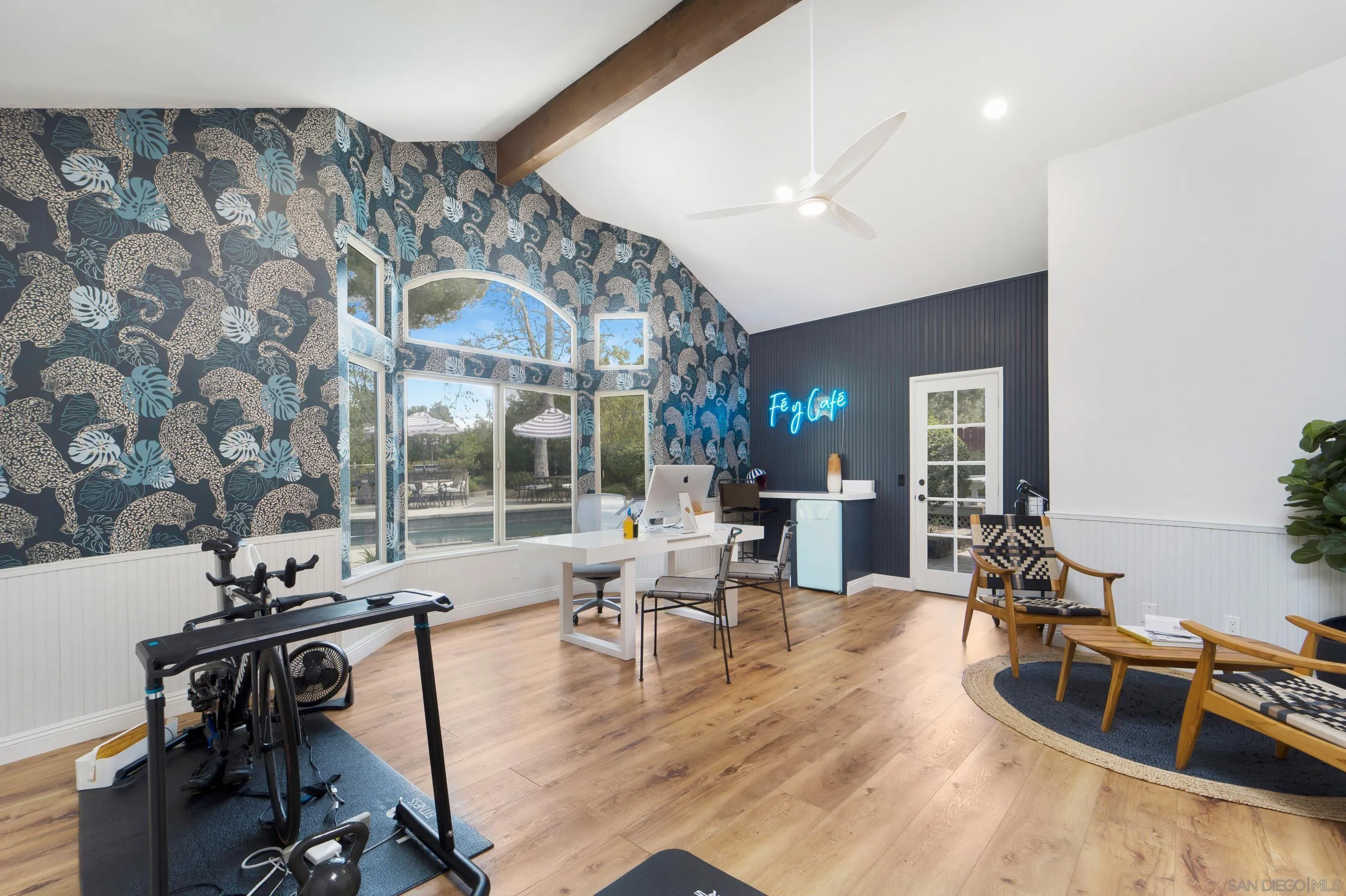 16163 Del Norte Poway, CA 92064 - Photo 22 of 41 a room with gym equipment and large windows