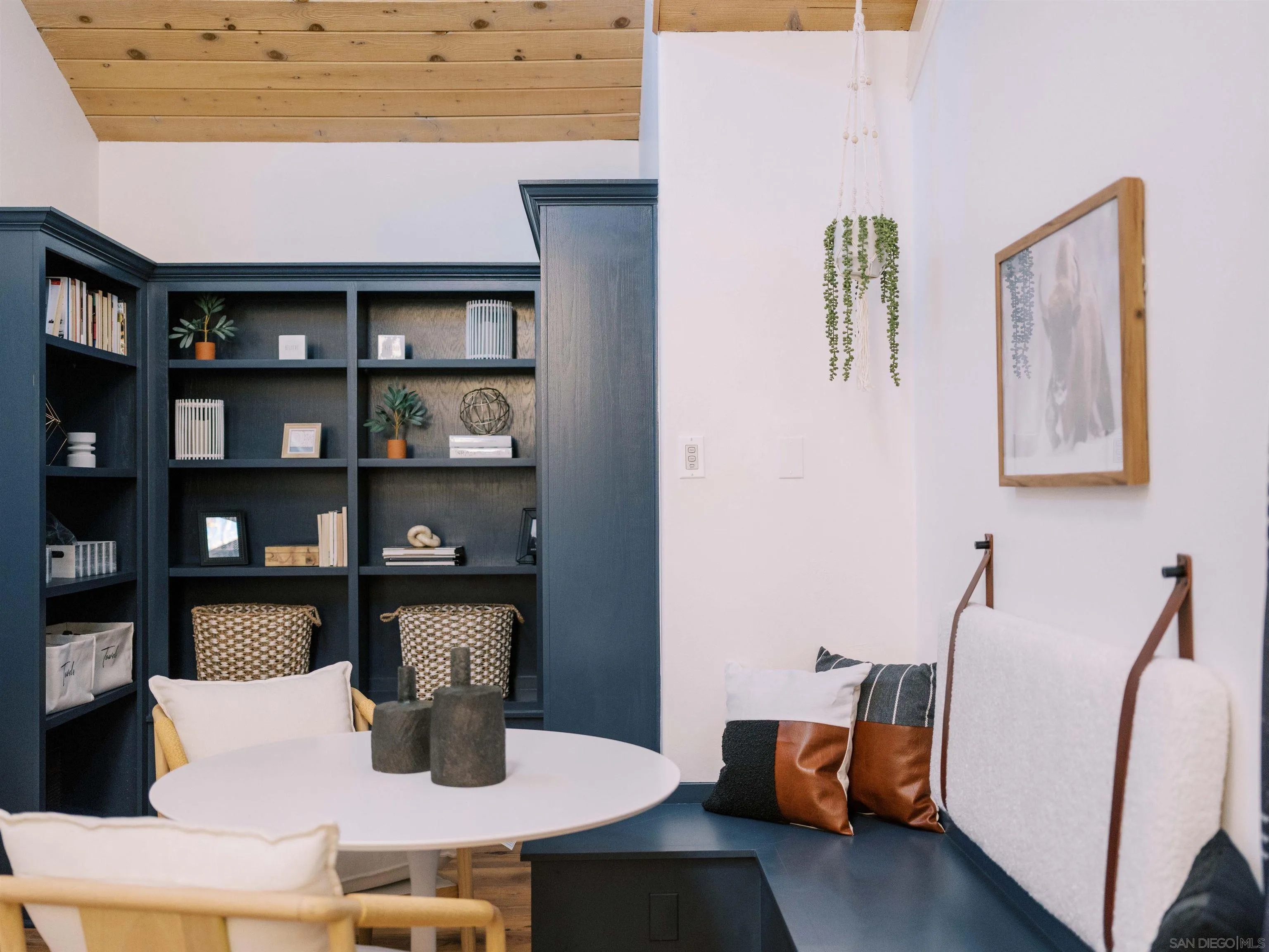 16163 Del Norte Poway, CA 92064 - Photo 24 of 41 a living room with furniture and a book shelf