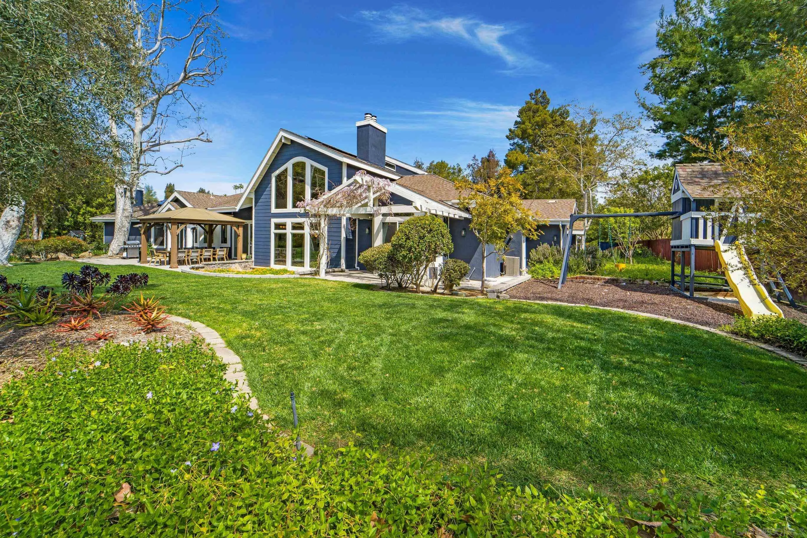 16163 Del Norte Poway, CA 92064 - Photo 36 of 41 a front view of a house with a yard