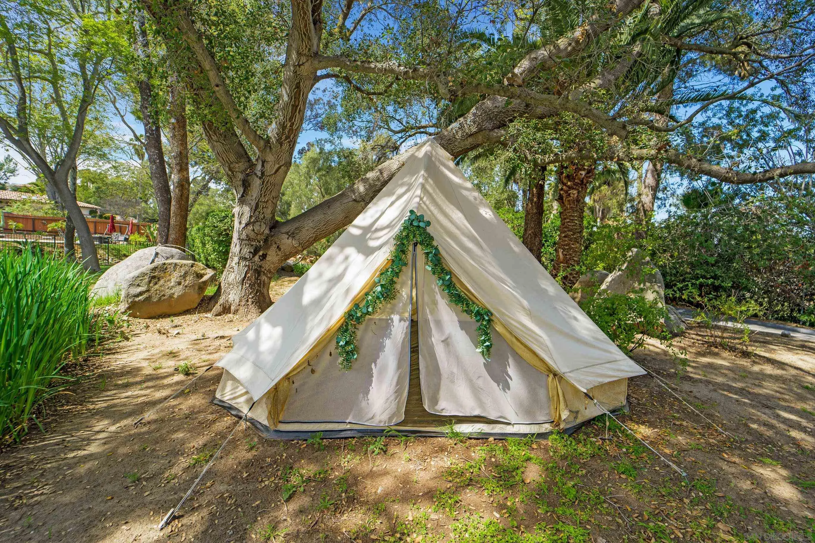 16163 Del Norte Poway, CA 92064 - Photo 37 of 41 a backyard of a house with a yard and outdoor seating
