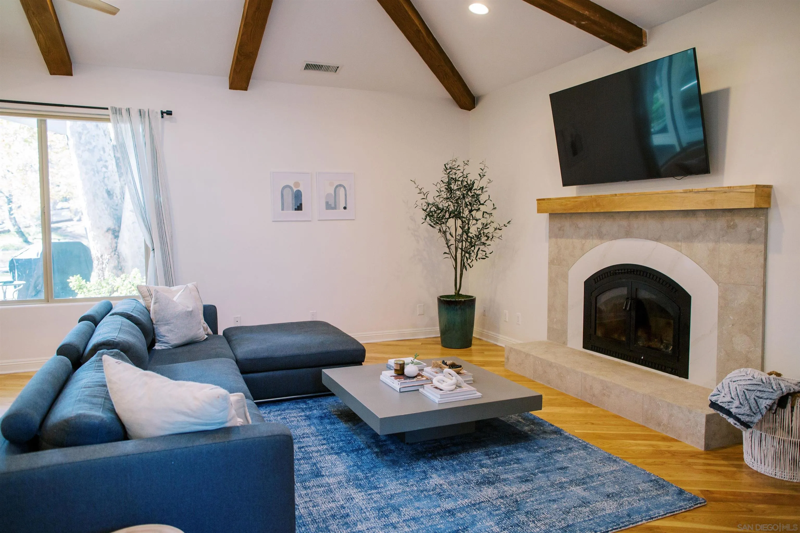 16163 Del Norte Poway, CA 92064 - Photo 10 of 41 a living room with furniture and a fireplace