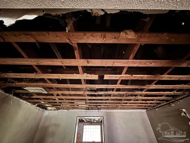 a view of a backyard of the house