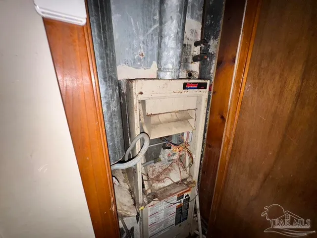 a side view of a house with a yard