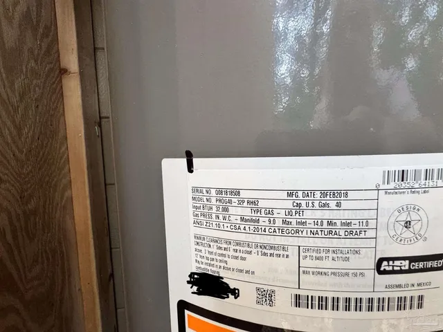 a view of a wooden house with a yard