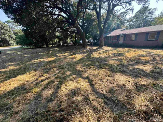 a room with furniture and a window