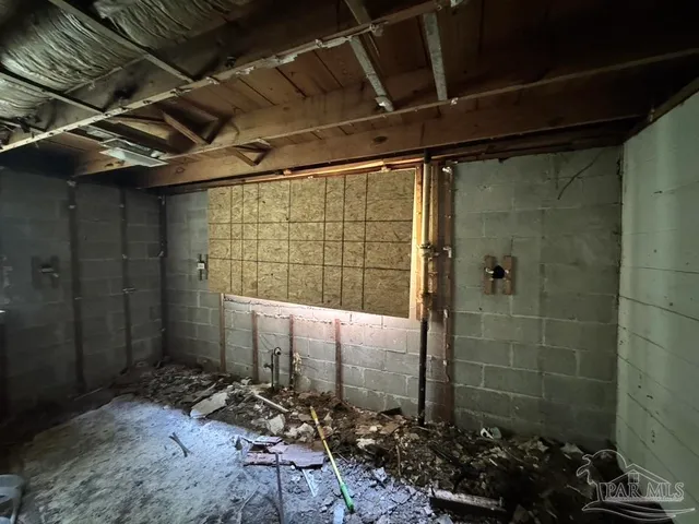 a bathroom with a bathtub and shower