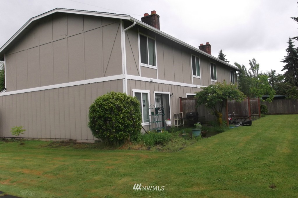 5116 Parker Road East Sumner, WA 98390 - Photo 8 of 8 a house with garden in front of it