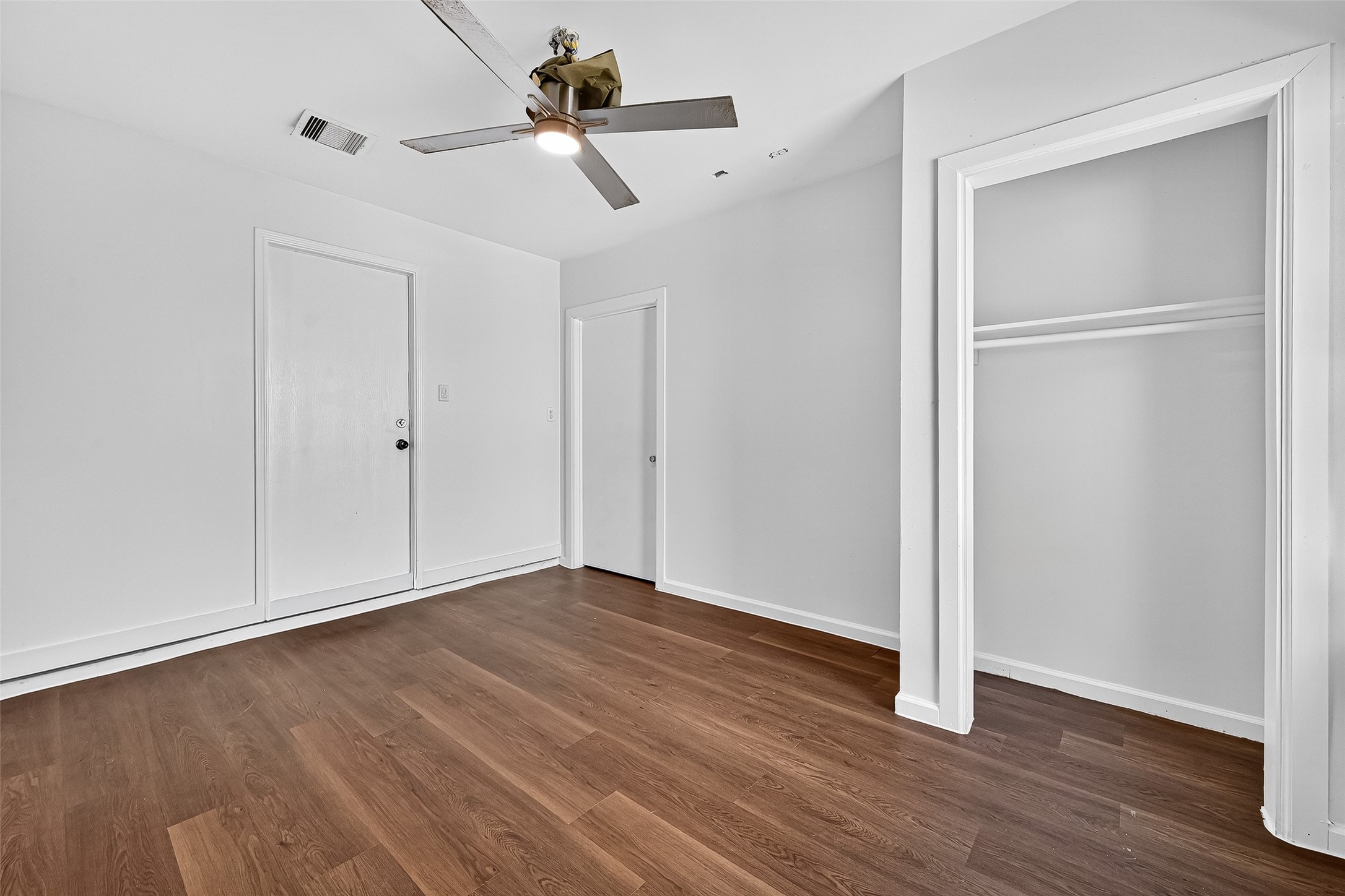 22819 Cabanna Road Spring, TX 77389 - Photo 12 of 26 a view of an empty room with wooden floor