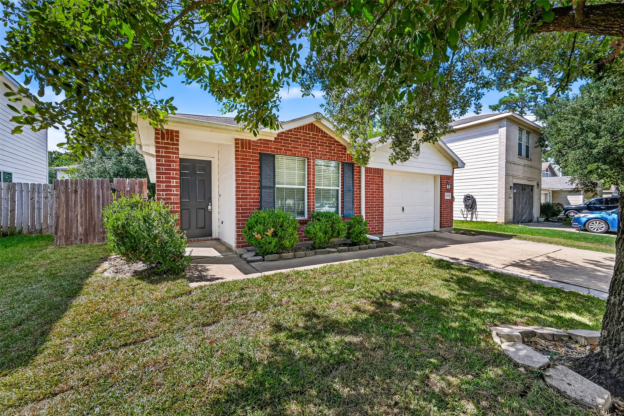 22819 Cabanna Road Spring, TX 77389 - Photo 2 of 26 a front view of a house with garden