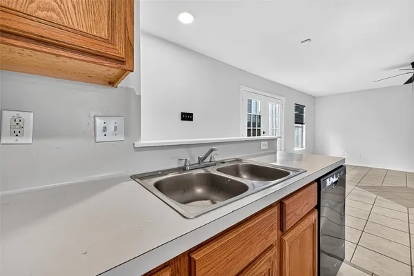 a kitchen with a stove and a microwave