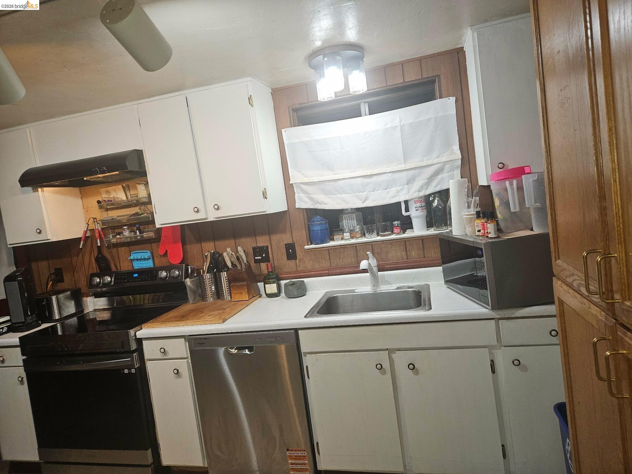 20772 Haiapo Road Mi Wuk Village, CA 95346 - Photo 11 of 11 a kitchen with a sink and cabinets