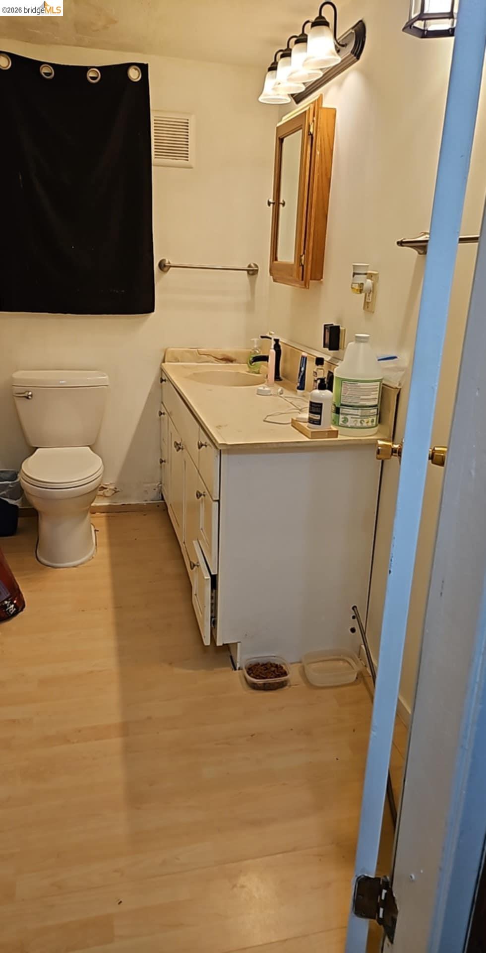 20772 Haiapo Road Mi Wuk Village, CA 95346 - Photo 9 of 11 a bathroom with a sink and a mirror