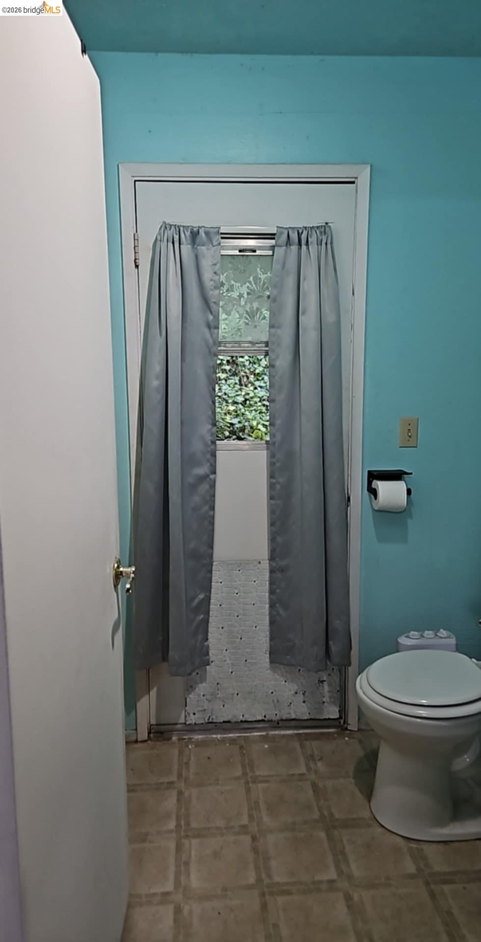 20772 Haiapo Road Mi Wuk Village, CA 95346 - Photo 10 of 11 a bathroom with a shower and a toilet