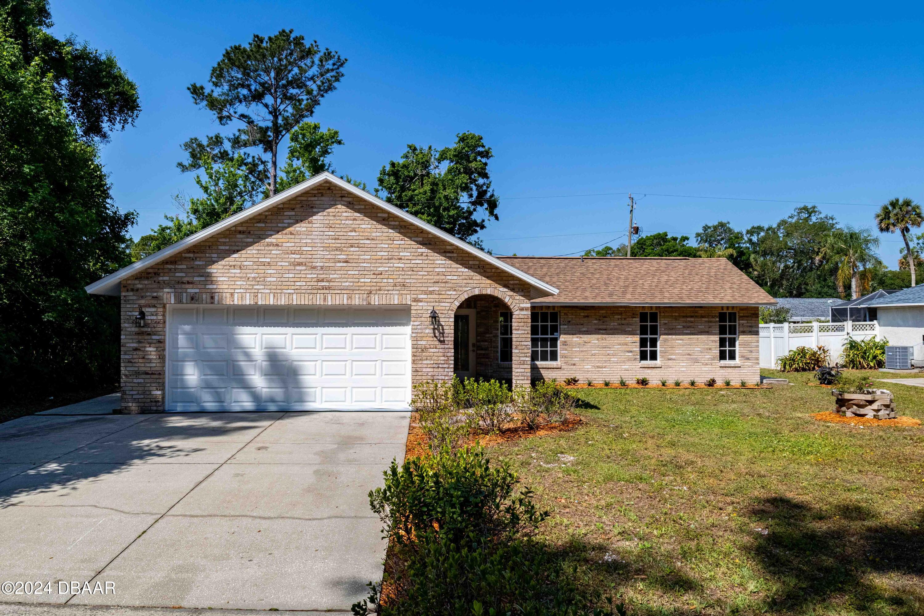 3016 Unity Tree Drive Edgewater, FL 32141 - Photo 1 of 21 3016 Unity Tree Dr-21