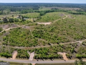 a view of a field with an outdoor space