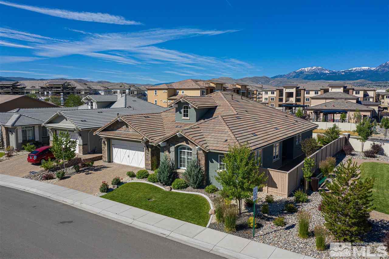 2060 Blue Boy Lane Reno, NV 89521 - Photo 1 of 25 a front view of a house with a garden