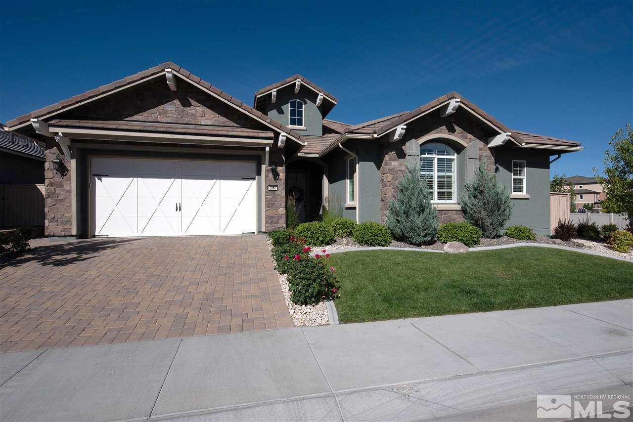 2060 Blue Boy Lane Reno, NV 89521 - Photo 2 of 25 a front view of a house with a yard