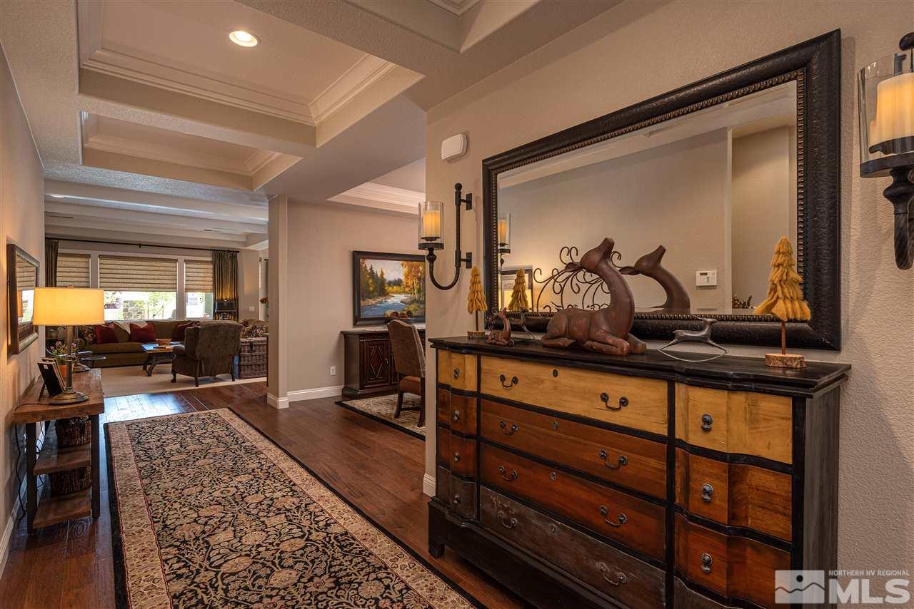 2060 Blue Boy Lane Reno, NV 89521 - Photo 3 of 25 a room with lots of wooden furniture and a wooden floor