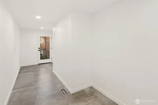 a view of a hallway with closet