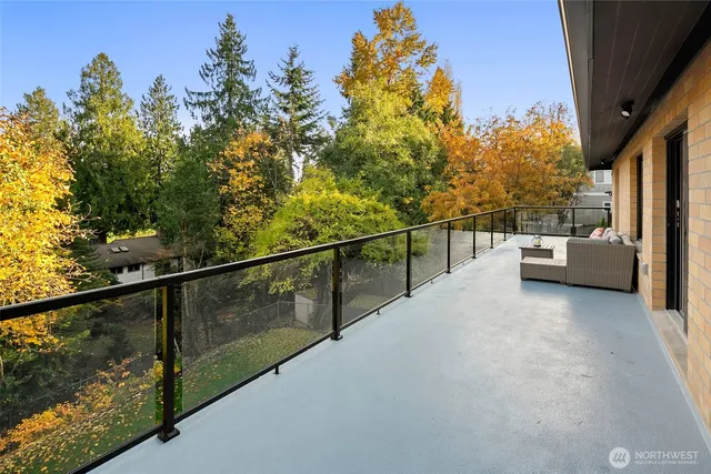 a view of balcony with furniture