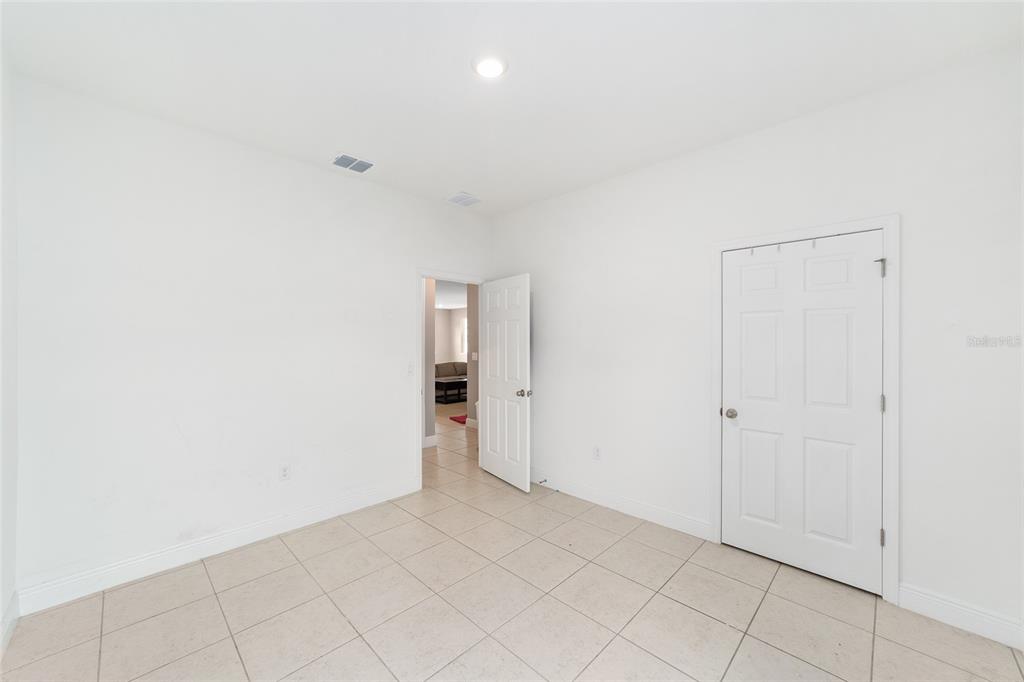 11102 Southwest 58th Avenue Road Ocala, FL 34476 - Photo 33 of 47 an empty room with white walls