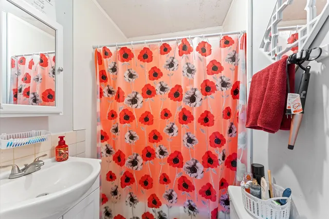 a bathroom with a sink and a bathtub