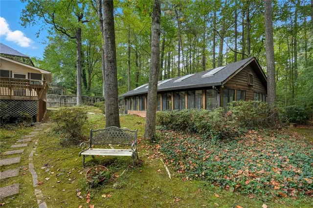 a view of a house with a yard
