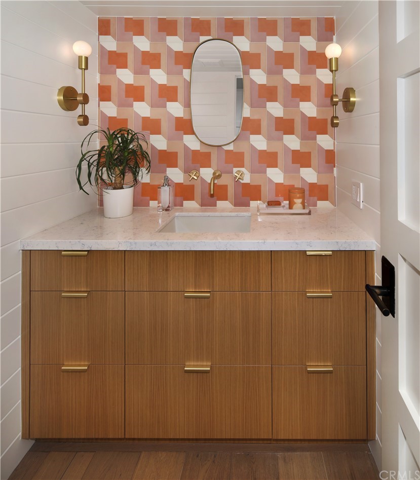 3164 Bern Drive Laguna Beach, CA 92651 - Photo 12 of 33 a bathroom with a sink and mirror