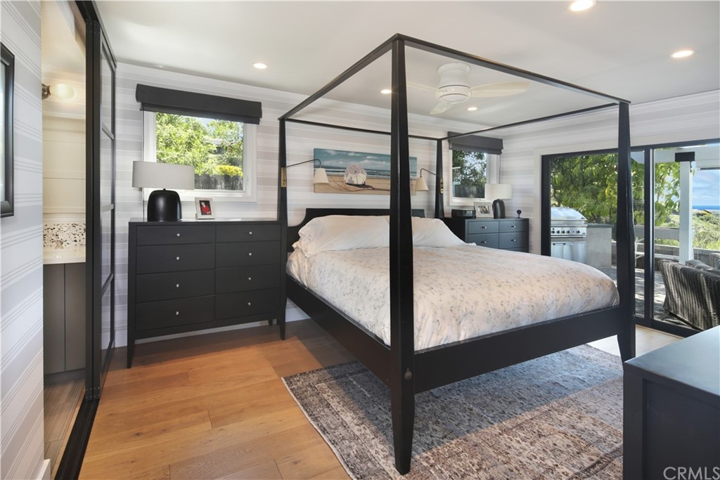 3164 Bern Drive Laguna Beach, CA 92651 - Photo 13 of 33 a bed sitting in a spacious bedroom next to a window