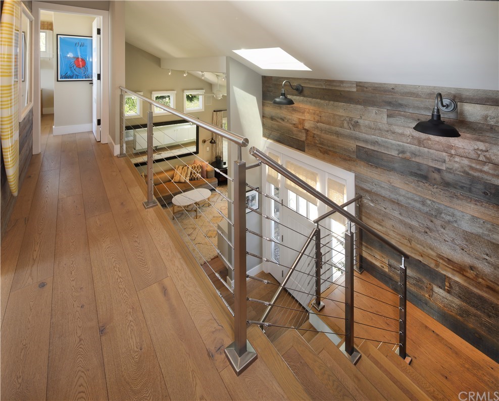 3164 Bern Drive Laguna Beach, CA 92651 - Photo 17 of 33 a view of entryway and hall with wooden floor