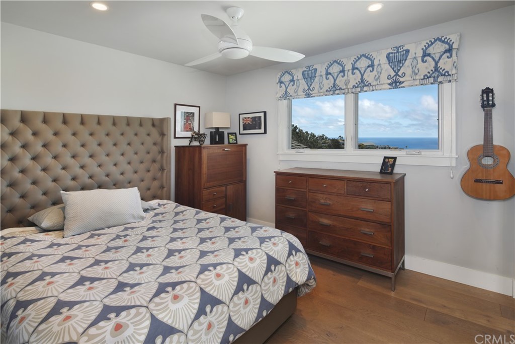 3164 Bern Drive Laguna Beach, CA 92651 - Photo 18 of 33 a bedroom with a bed and a window