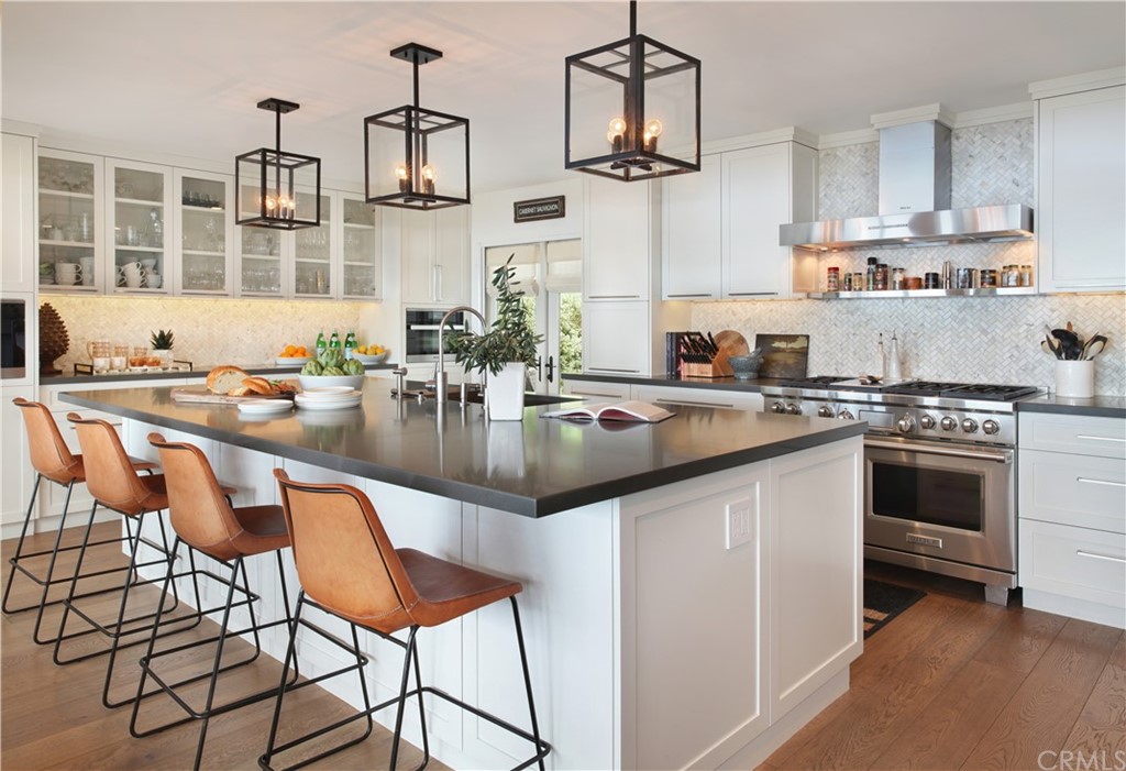 3164 Bern Drive Laguna Beach, CA 92651 - Photo 2 of 33 a kitchen with stainless steel appliances granite countertop a sink and cabinets