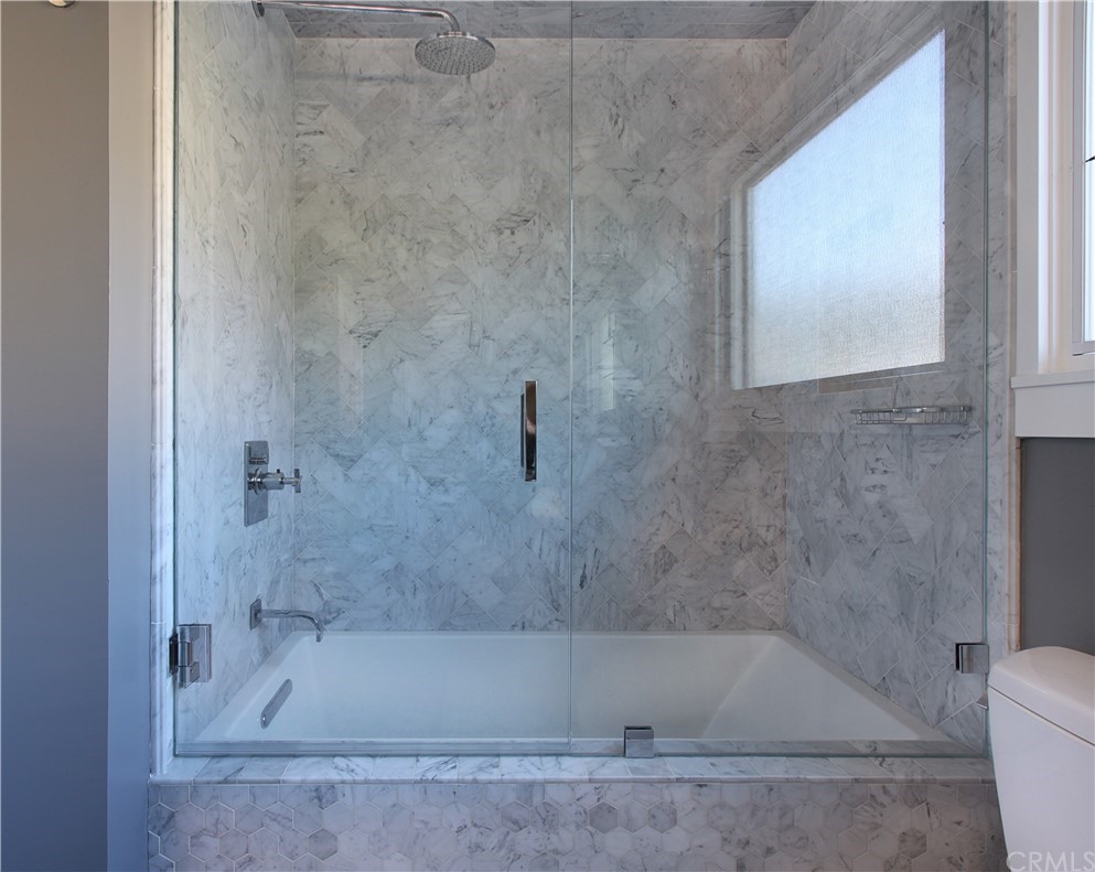 3164 Bern Drive Laguna Beach, CA 92651 - Photo 21 of 33 a bathroom with a bathtub and a toilet