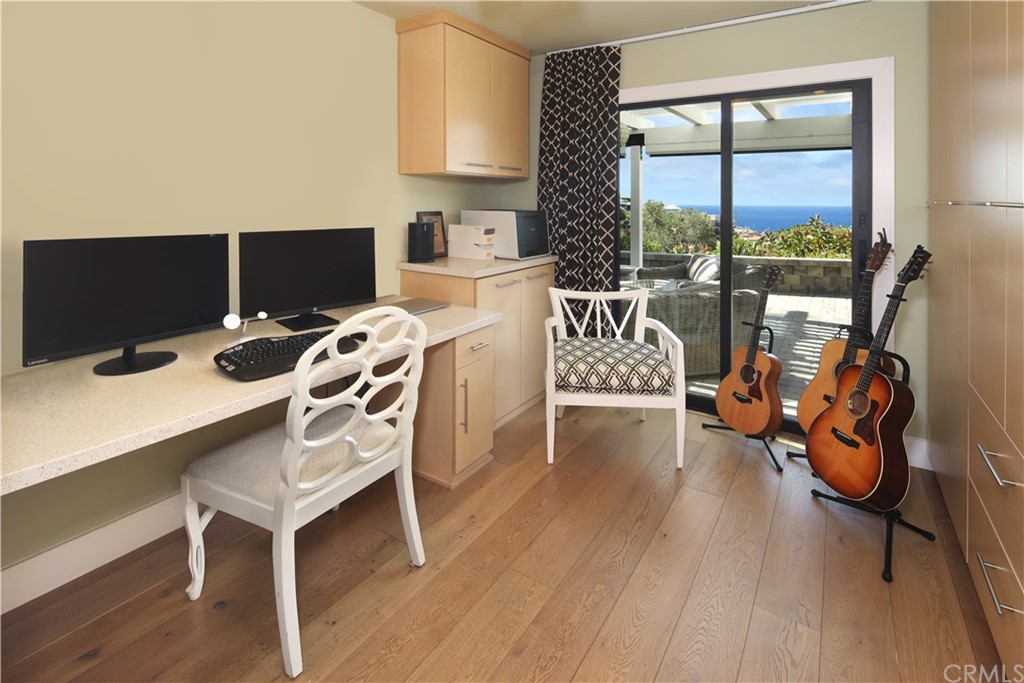 3164 Bern Drive Laguna Beach, CA 92651 - Photo 23 of 33 a view of a workspace with furniture and windows