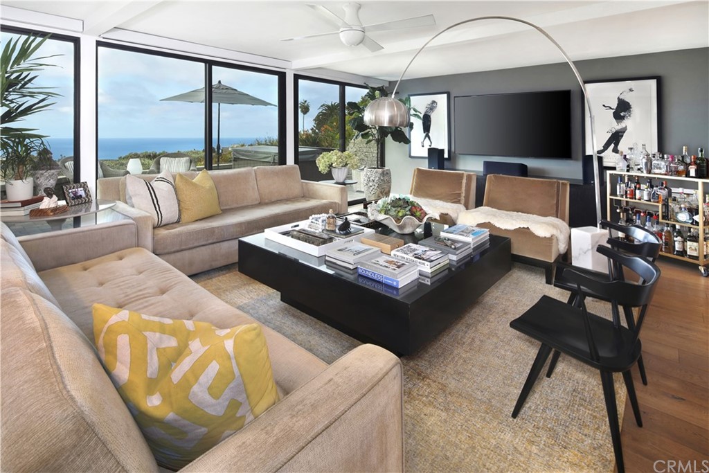 3164 Bern Drive Laguna Beach, CA 92651 - Photo 9 of 33 a living room with furniture and a large window