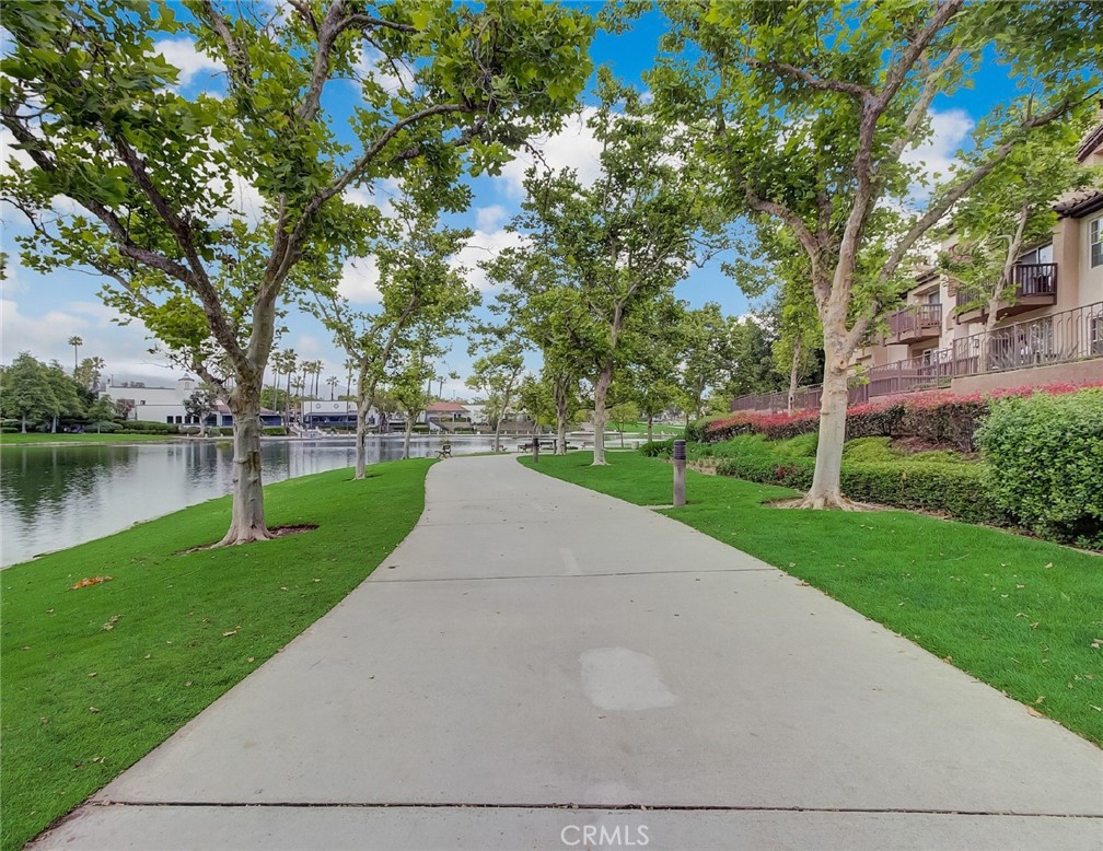 12 Montana Del Lago Drive, Unit 168 Rancho Santa Margarita, CA 92688 - Photo 3 of 23 a view of a park with large trees