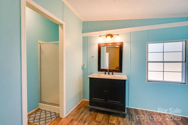 a view of room with furniture and windows