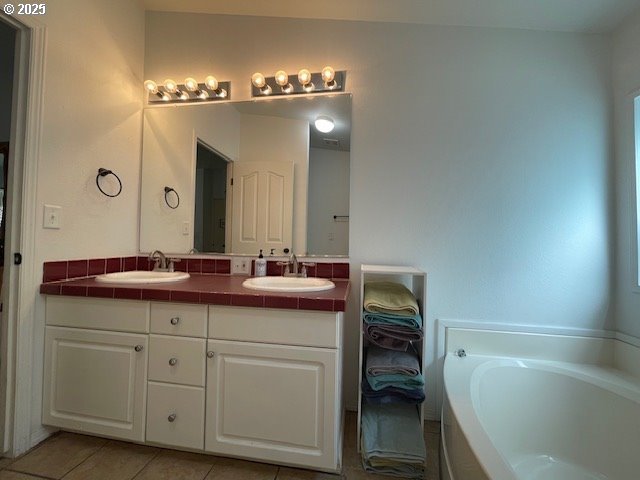 56129 Tom Smith Road Bandon, OR 97411 - Photo 8 of 27 a bathroom with a double vanity sink and a