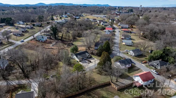an aerial view of residential house with outdoor space