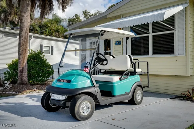 a car parked in front of a house