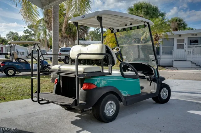 a car parked in front of a house
