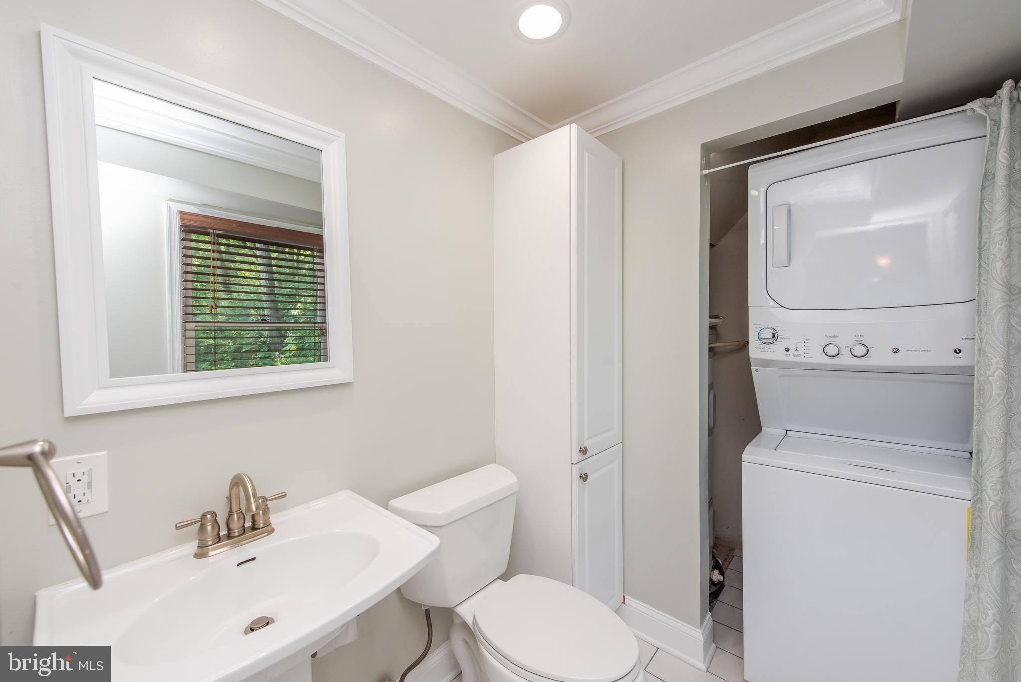 8659 Frederick Road Ellicott City, MD 21043 - Photo 7 of 19 Powder Room and Laundry