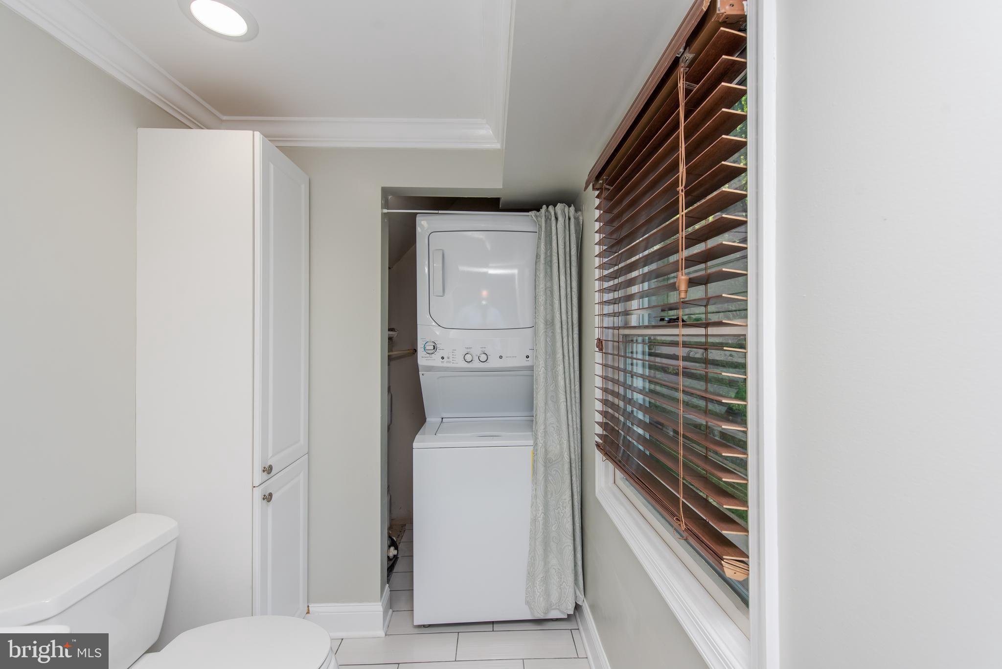 8659 Frederick Road Ellicott City, MD 21043 - Photo 8 of 19 Powder Room and Laundry