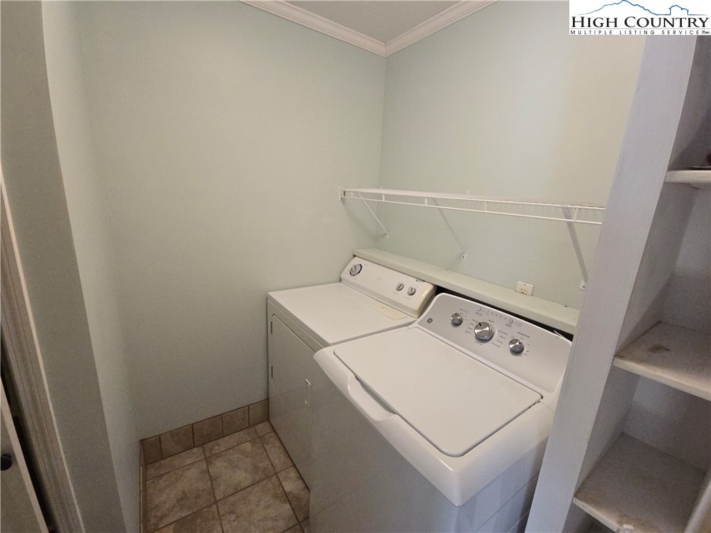 709 Deep Ford Road Lansing, NC 28643 - Photo 23 of 33 a utility room with dryer and washer