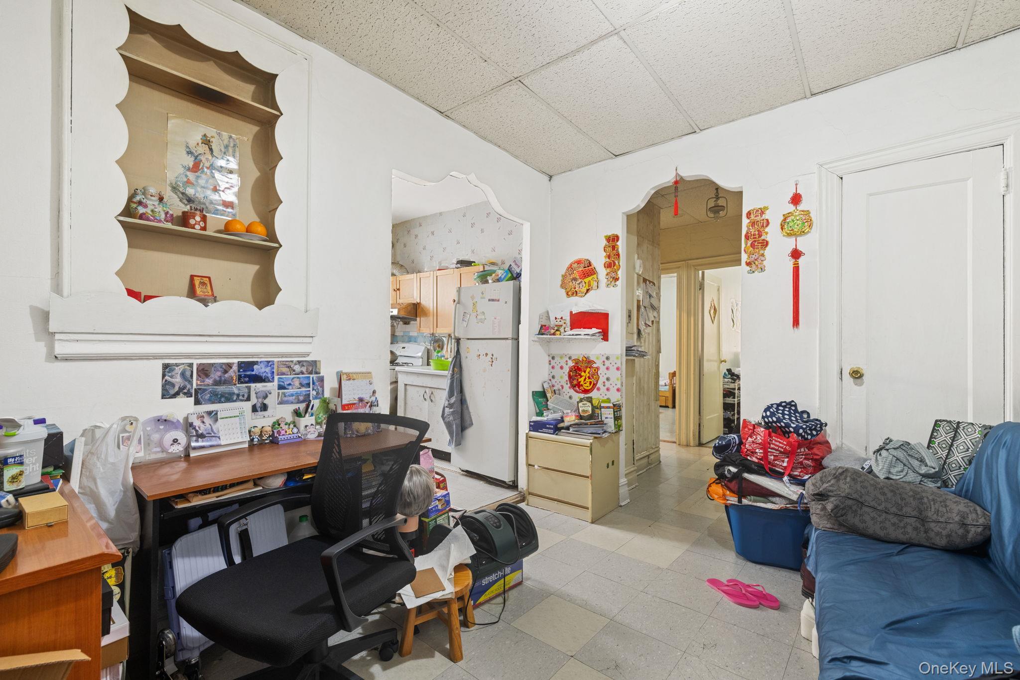 149 Dahill Road Brooklyn, NY 11218 - Photo 15 of 36 a work room with furniture and toys