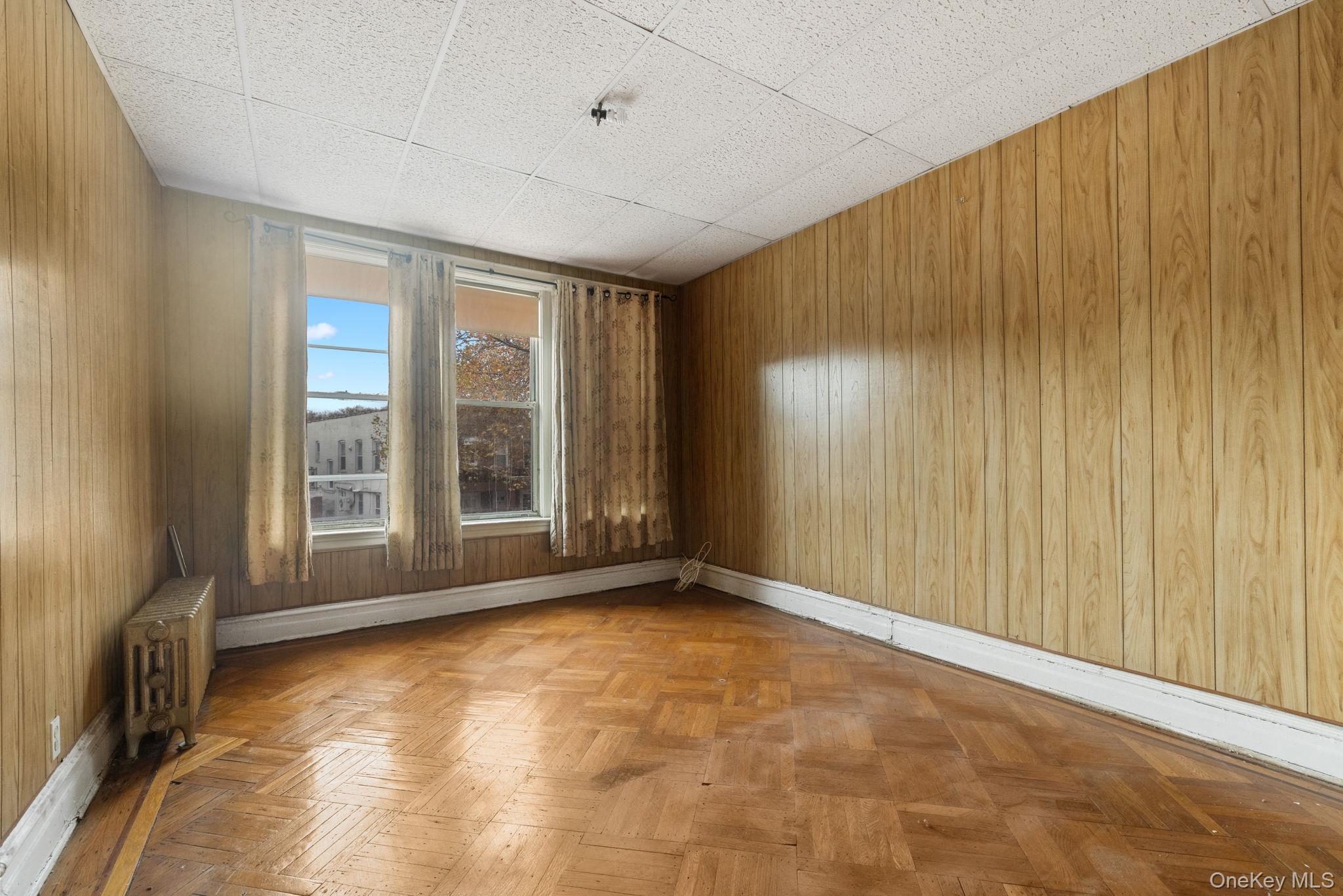 149 Dahill Road Brooklyn, NY 11218 - Photo 20 of 36 a view of an empty room with a window